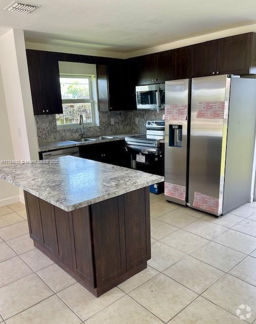 Building Photo - 3177 NW 53rd St Unit 1 Rental