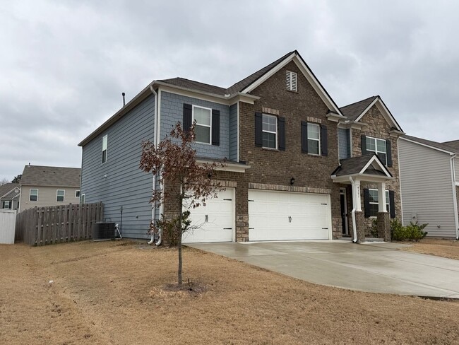Photo - Beautiful and Spacious 5BR 4.5BA Home w/ Full Appliance Kitchen • Garage in Fairburn