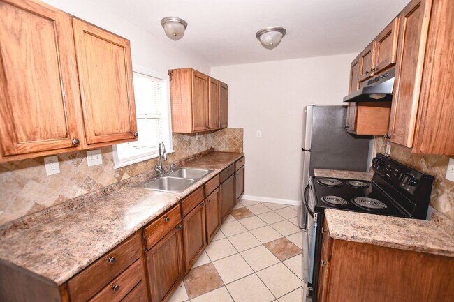 Photo - 4 Bedroom / 3 Bath Single Family Home