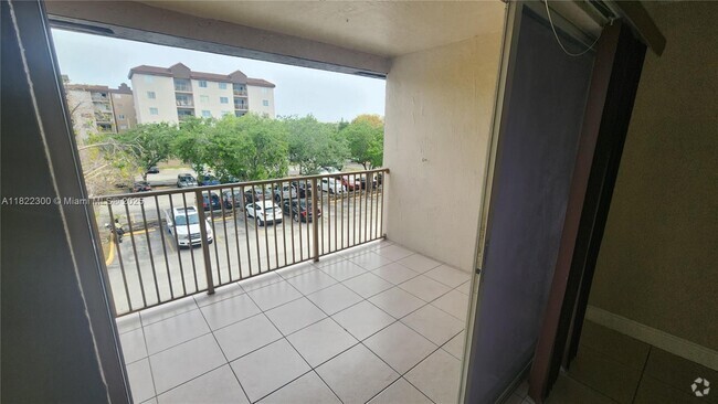 Building Photo - 15201 SW 80th St Unit 305 Rental