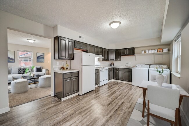 3 BR 2 BA Recently Renovated Townhouse Style Apartments featuring New gray carpet, Neutral paint scheme, Premium hardwood-style flooring, Neutral paint scheme, Upgraded light fixtures, New cabinets, Matching stainless steel appliances, Washer/Dryer, Air conditioning, Heating, New bathroom vanity, Ma