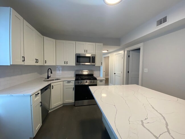 Building Photo - NEWLY GUT RENOVATED Jeffries Point 3 bed + office (or 4 bedroom) unit