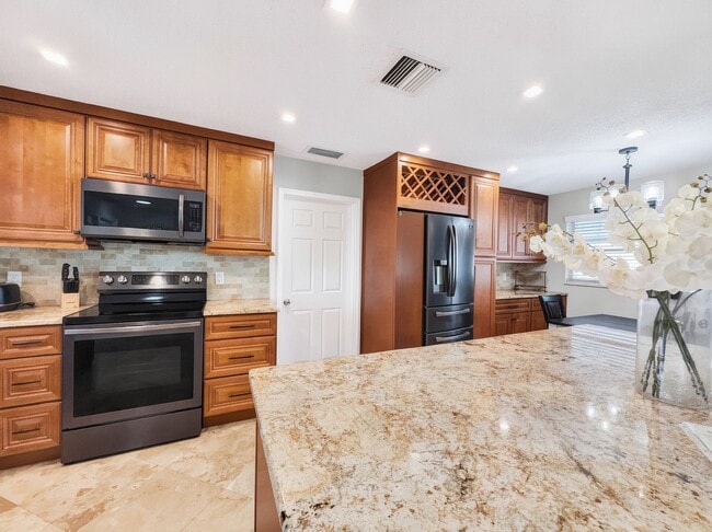 Photo - Discover the perfect Naples Park rental just minutes from the beach.