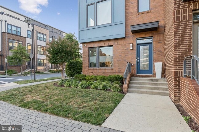 Photo - Perfectly located just steps from the Red Line Metro, this EYA-built Davis Model townhome at West...