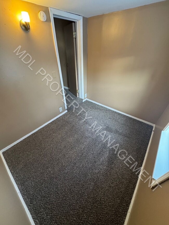 Photo - Charming 2-Bedroom Home with Bonus Room, Spacious Kitchen & Great Outdoor Space