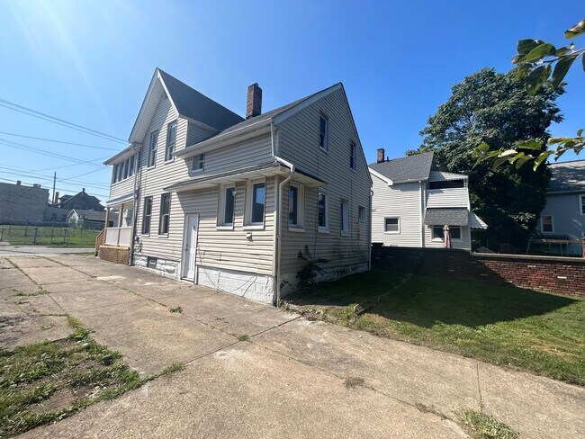 Photo - Welcome to this spacious 6-bedroom, 2-bathroom house located in the vibrant city of Cleveland