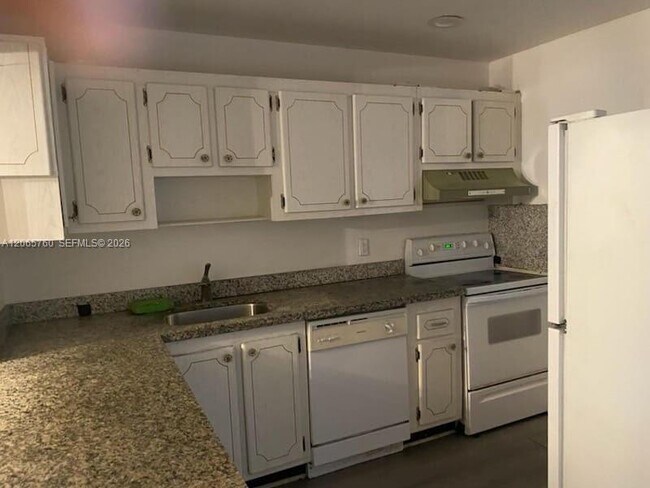 Photo - 410 SE 2nd St Unidad 408