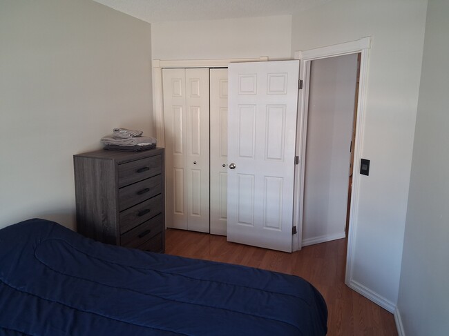 Photo - Modern 2-Bedroom Condo with Underground Parking in Prime Calgary Location Unit 1