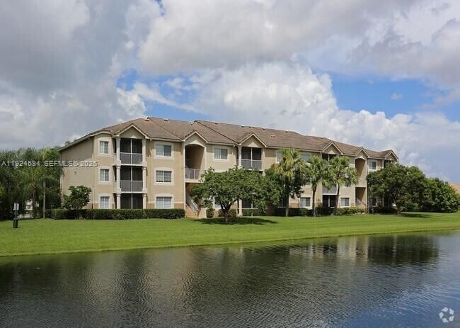 Building Photo - 8965 Okeechobee Blvd Unit 107
