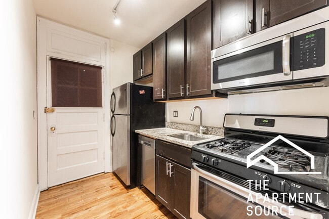 Building Photo - 4725 N Leavitt St Unit 1