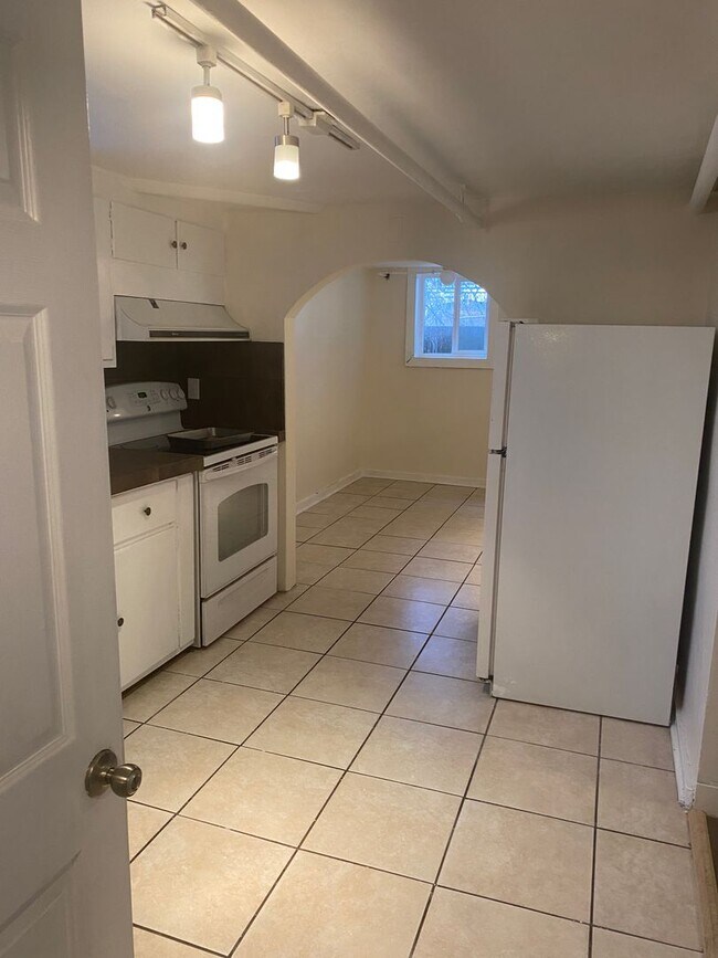 Photo - 2 Bed / 1 Bath Garden-Level Apartment – Available Early April!