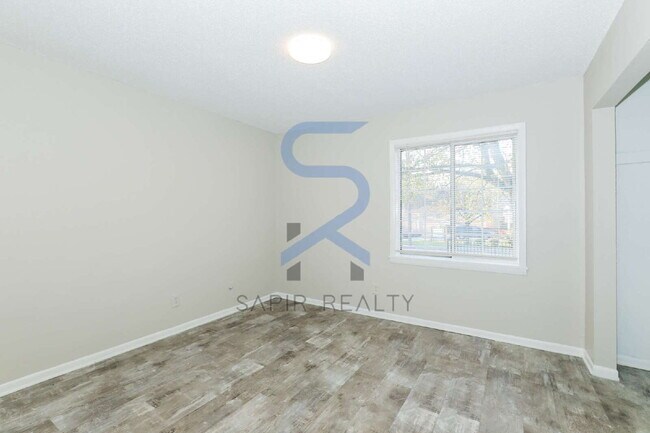 Photo - Move-In Ready! Freshly Updated 2BR/1.5BA with All-Electric Living Unit 6