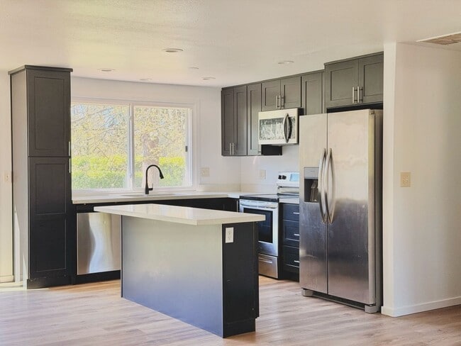 Photo - Charming 4BR Home with Huge Yard - W/D and Garage