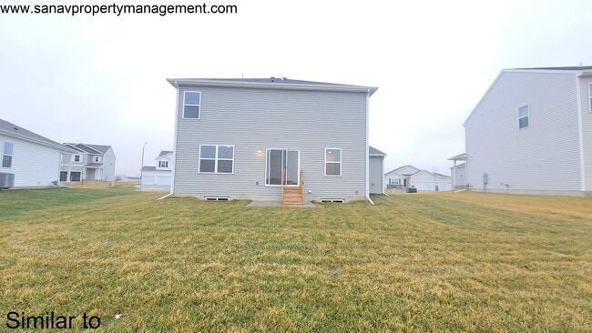 Photo - Turnkey Elegance: 4BR, 2.5BA Two-Story Haven with Gourmet Kitchen & Luxurious Master Suite!-3 CAR...