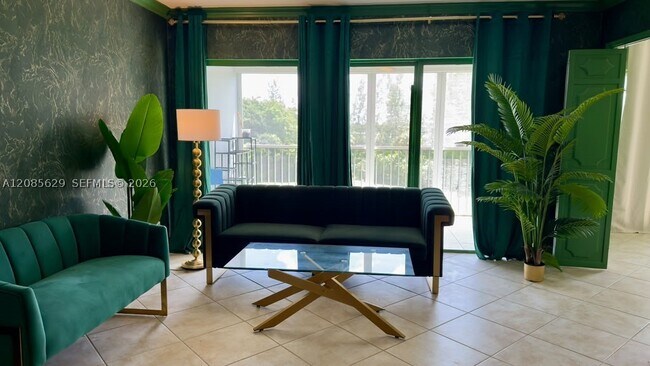 Building Photo - 3150 N Palm Aire Dr Unit 503