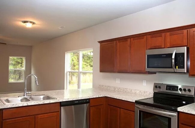 Photo - 4-Bedroom, 2-Bathroom West Fayetteville Home with fenced in backyard and 2x car garage - Availabl...
