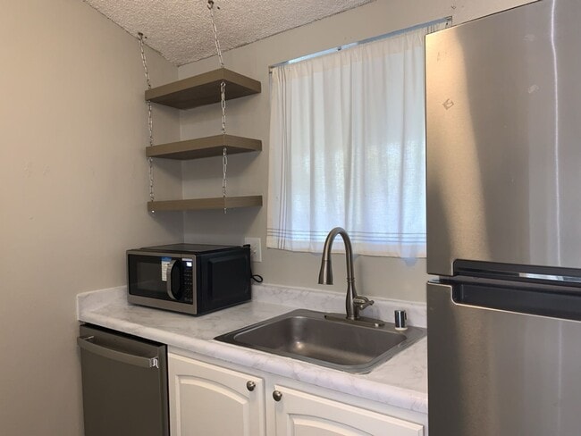Photo - Elegant Auburn Condo 1Bd/1Ba Unit J203