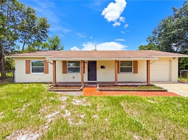 Photo - Fully Remodeled 3-Bedroom Home with Bonus Florida Room & Huge Fenced Yard