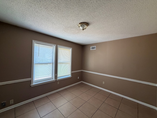 Photo - Charming 3BR/2BA Bartlett Area Home | Soaring High Ceilings, Rustic Fireplace & Fenced Yard
