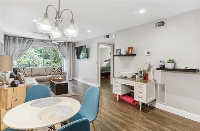 Family room view 4(virtually staged view) - 3117 Colonial Way Unit J