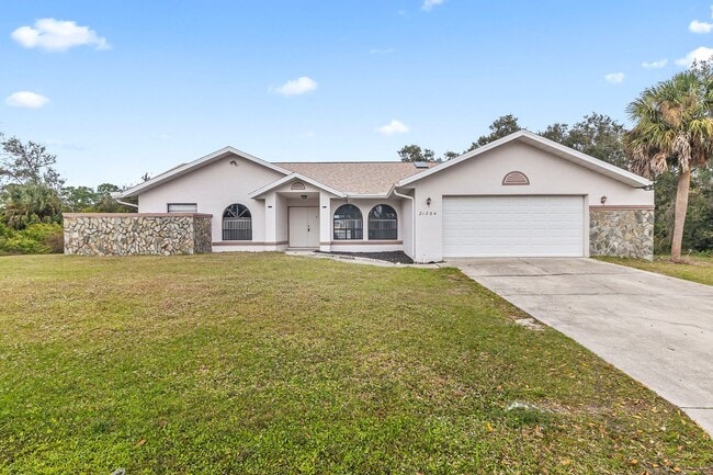 Building Photo - Annual ** 4 Bed / 3 Bath Single Family Home -- $1,950/month