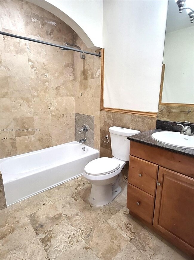 Building Photo - 1016 71st St Unit 203