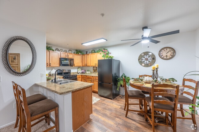 2BR, 2BA - 962SF - Kitchen and Dining - Carefree Senior Living at the Willows (55+)