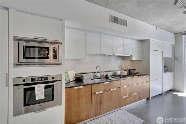 Photo - Unique 1 bed/1bath, 200 sqft patio, 2 parking spaces, high end finishes. Unit C243