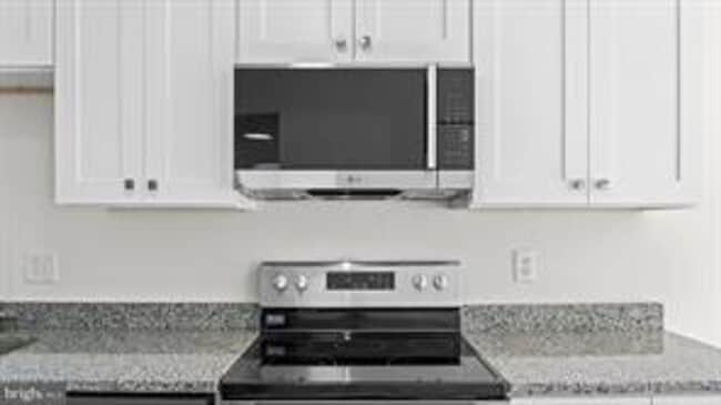 Photo - RENOVATED TOWNHOUSE WITH 3 BEDROOMS AND 1.5 BATHS, FENCED BACKYARD