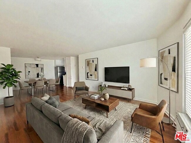 Building Photo - 5805 W 8th St Unit 318