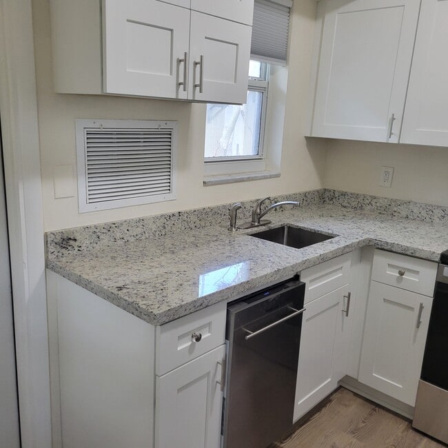 new granite counter tops - 2031 NE 56th St Unit 1