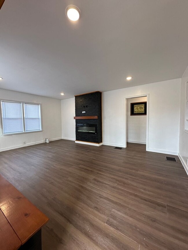 Photo - Immediate Move-In! Renovated 2BR House Near Ball State w/ Fireplace & Outdoor Space