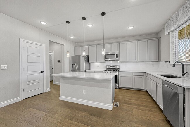 Photo - Former Model Home - Superb townhome in great location!