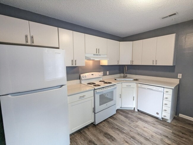 Photo - Private Fenced Yard + 3BR Townhome – Great Location!