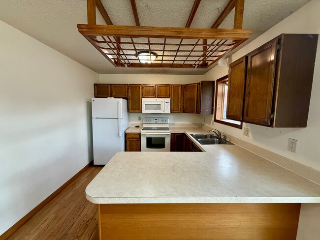 Photo - Large 4 Bedroom/2 Bath Bi-Level Home with attached 2 Car Garage in North Loveland