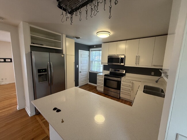 Photo - Updated 3 bed 2 bath. Garage and screened porch