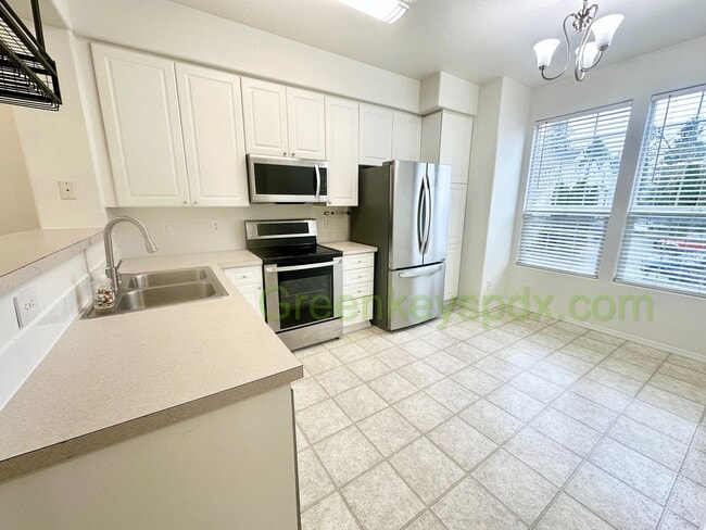Photo - Amazing 2-Bedroom Townhouse with 2.5 Bathrooms, Attached Garage, Private Fenced Patio