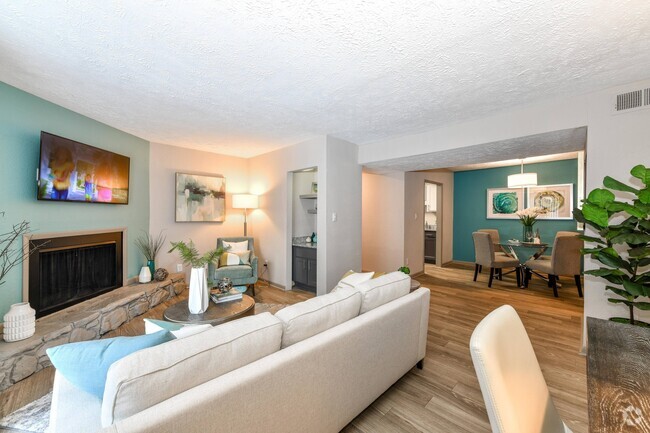 Living Room with Hardwood Style Flooring - Vue at Crestwood Rental