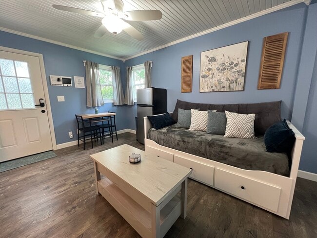 The couch pulls out into another large bed if needed. Also contains 3 deep drawers for storage. - 908 Lake Rd Unit New Lenox