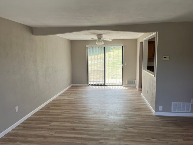 Dining Area with new ceiling fan. - 608 Sangree Rd