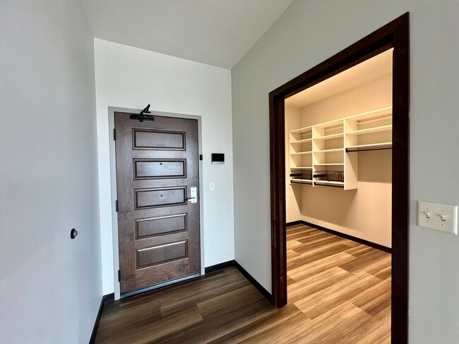 Walk-in Coat Closet - Bridge Plaza Apartments