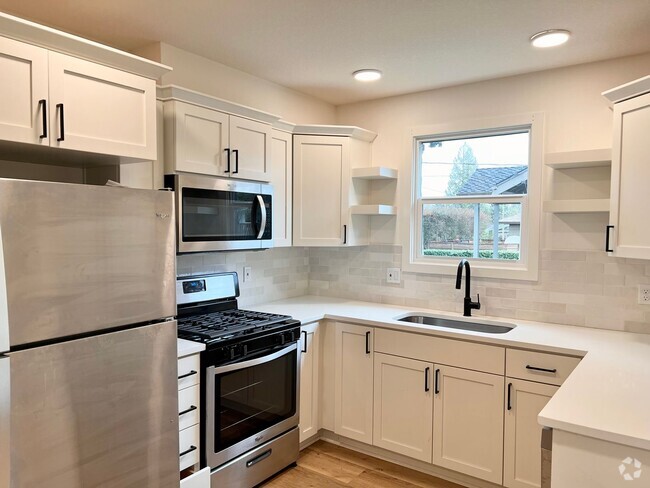 Building Photo - Modern Two-Story Gem: 3BD/1BA Home with Bo...