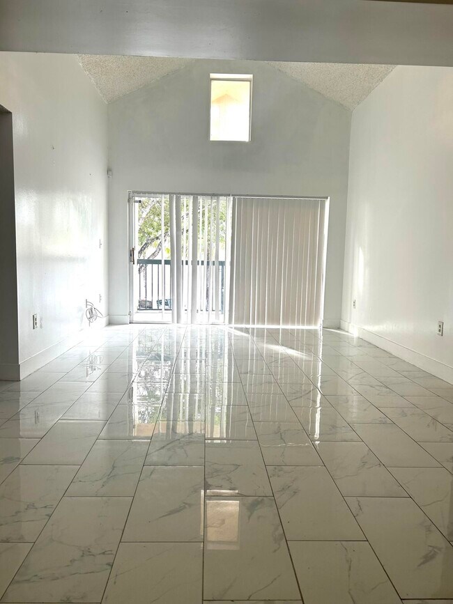 Building Photo - 6296 NW 186th St Unit 210