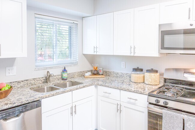 Kitchen (cabinets & appliances vary) - Westwood Suites Rental