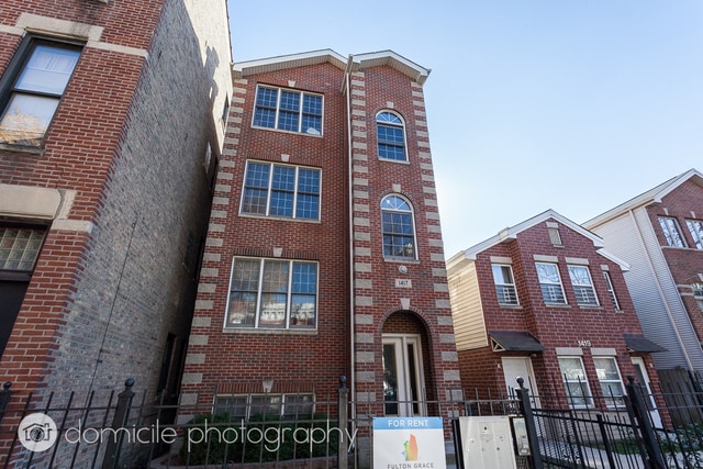 Building Photo - 1417 W Erie St Unit 2