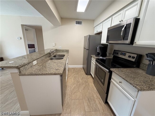 Building Photo - 5327 Summerlin Rd Unit 2707