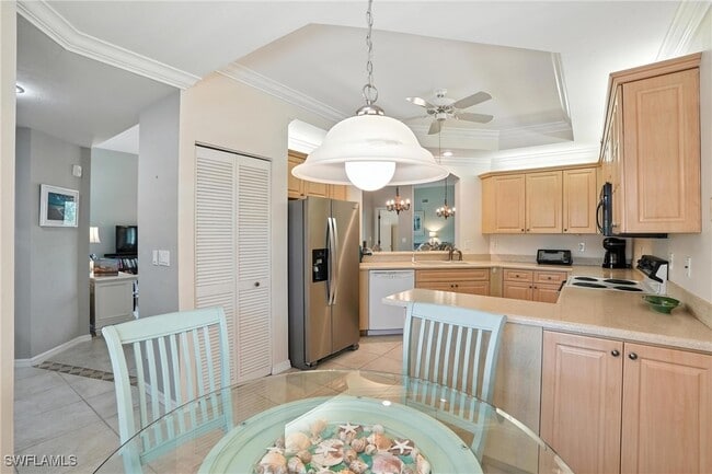 Building Photo - 7032 Pelican Bay Blvd Unit E304
