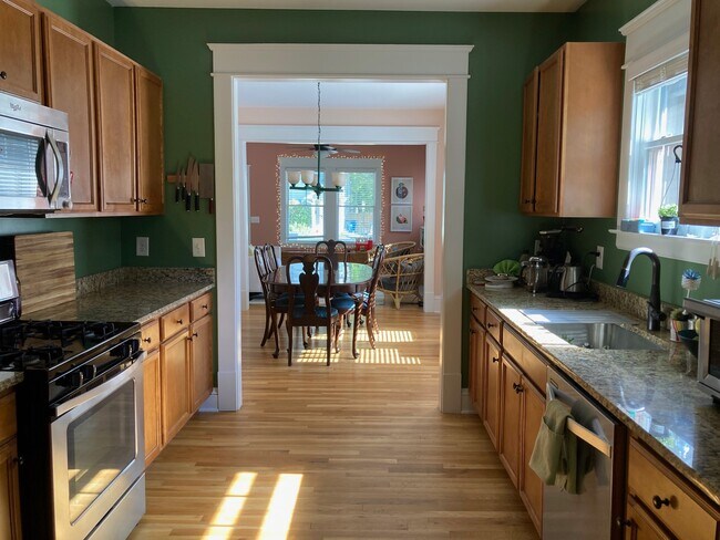 Kitchen (view from laundry room) - 212 E Geer St