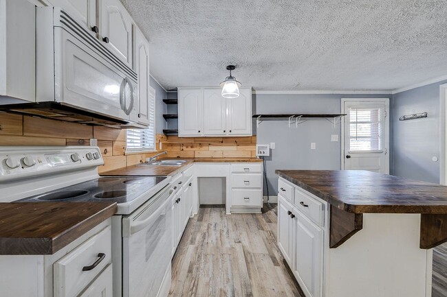 Photo - Charming 3-Bedroom 1.5 Bath Cottage-Style Bungalow with Open Floorplan and Kitchen Island