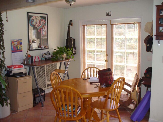 Dining room, french doors to pvt deck - 729 Brooks Ave Apartments Unit 4